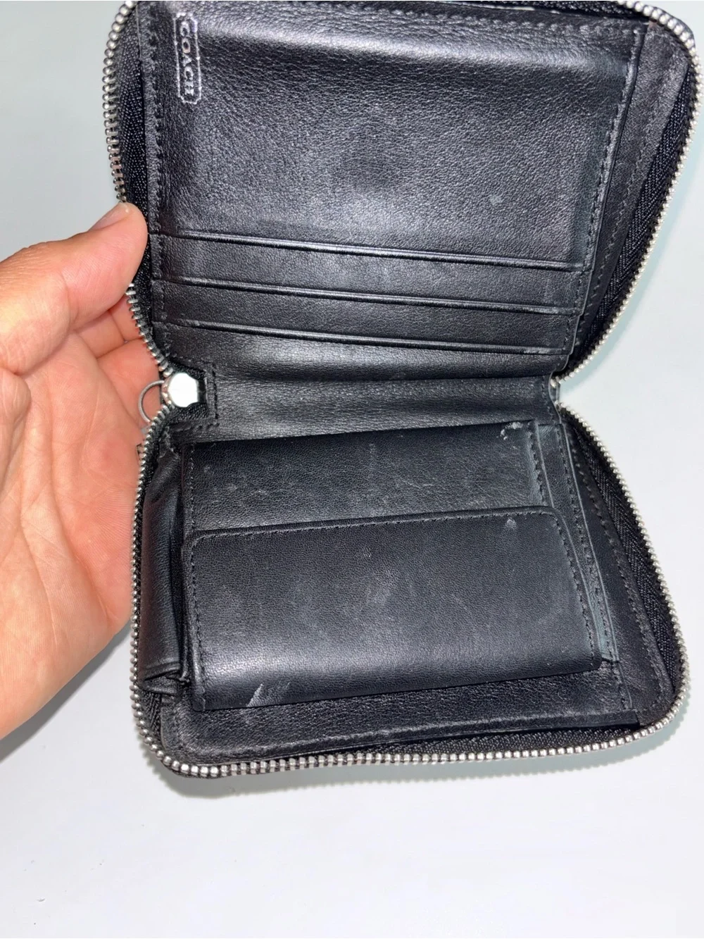 Coach Black Leather Zip-Around Wallet with Contrast Stitching